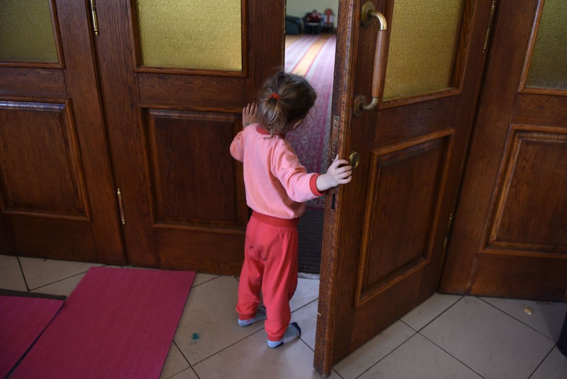 The last time Arina Matiushenkova, 3, was in Lviv station she had just fled home with her mother, Yana. After struggling to settle into Poland, they left. "It was hard for Arina ... At home, I think it will be much easier," Yana said.