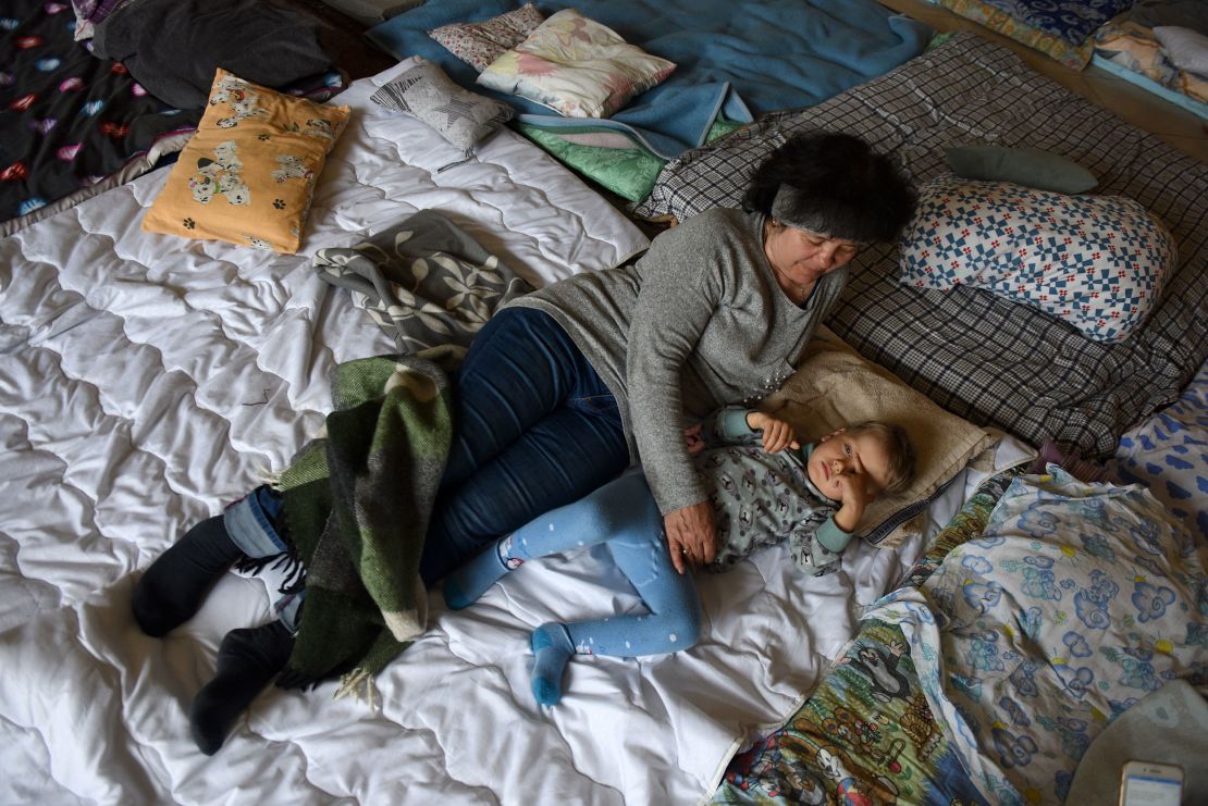 Valentyna, 58, with her grandson Andrii. She said she hopes that Russian mothers will hear about what their soldiers are doing to Ukrainian women.