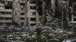 A Ukrainian serviceman walks amid the rubble of a building heavily damaged by multiple Russian bombardments near a frontline in Kharkiv, Ukraine, Monday, April 25, 2022. (AP Photo/Felipe Dana)