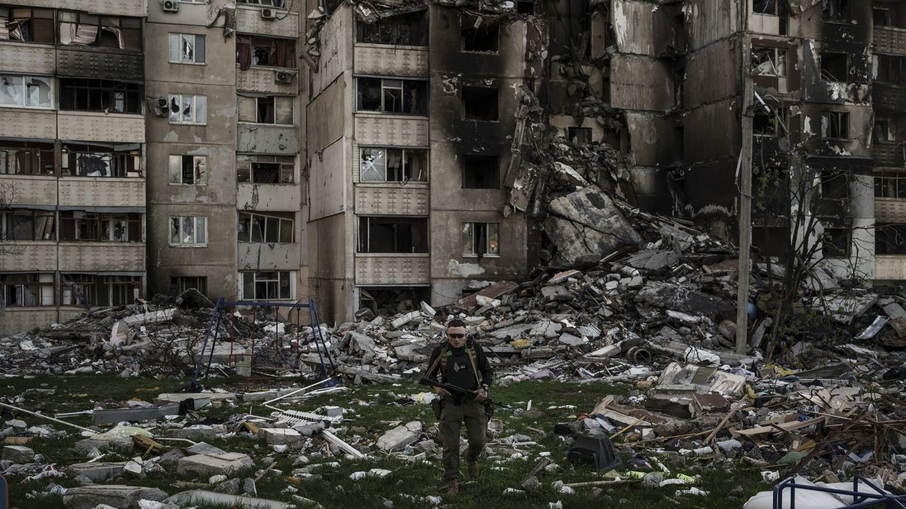 A Ukrainian serviceman walks amid the rubble of a building heavily damaged by multiple Russian bombardments near a frontline in Kharkiv, Ukraine, on Monday.