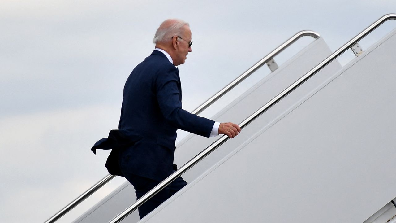 US President Joe Biden boards Air Force One on April 14, 2022.