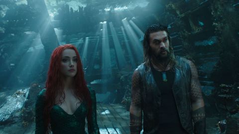 Amber Heard as Princess Mera and Jason Momo as Aquaman. 