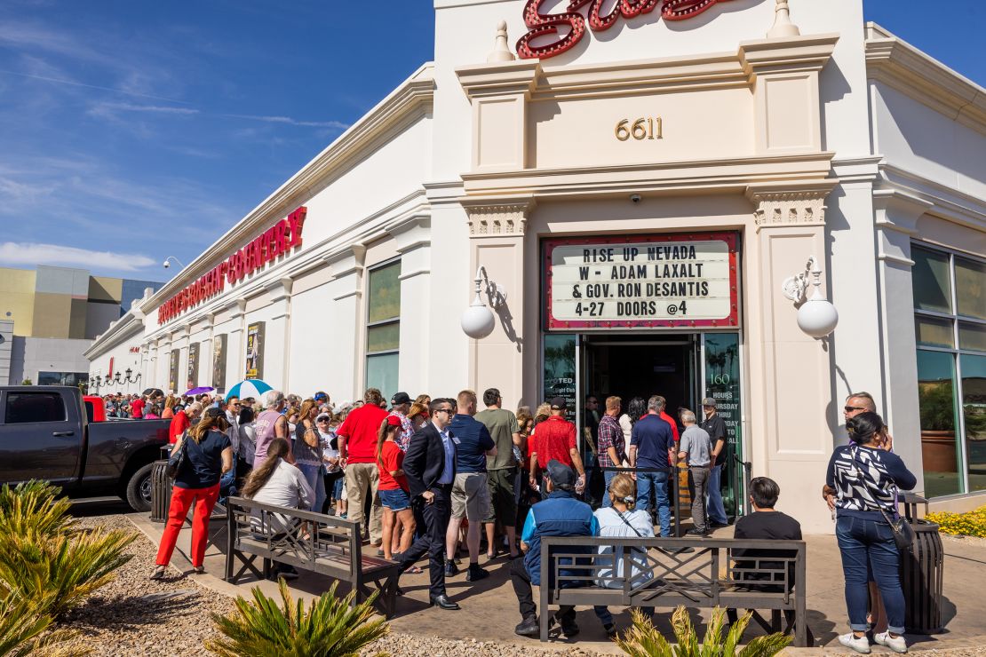 Attendees wait in line at Stoney's Rockin' Country in Las Vegas on April 27, 2022 ahead of DeSantis' apperance with Senate candidate Adam Laxalt.
