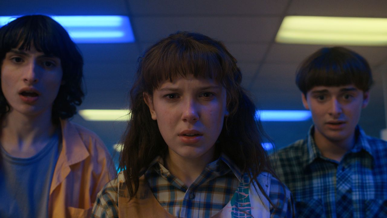(From left) Finn Wolfhard as Mike Wheeler, Millie Bobby Brown as Eleven and Noah Schnapp as Will Byers are shown in a scene from "Stranger Things." 