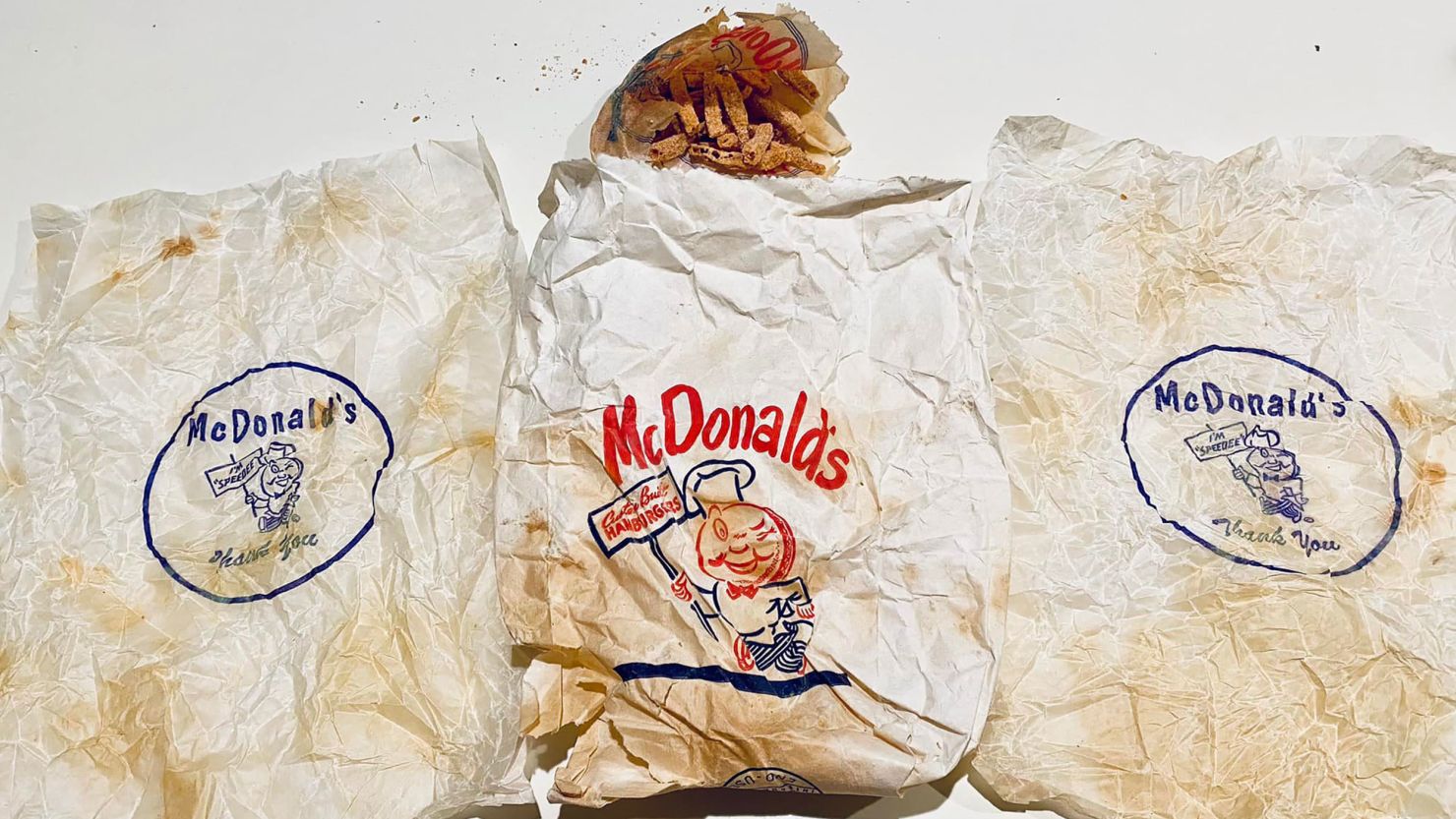 Rob and Gracie Jones found two hamburger wrappers and a half-eaten order of fries in a McDonald's bag behind their bathroom wall.
