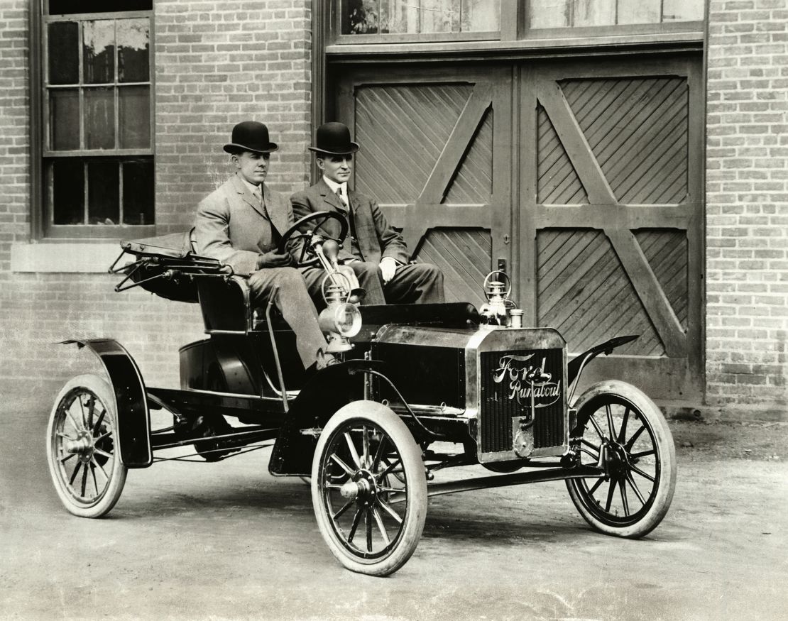 Henry Ford (right) and David Gray, a Ford Motor Co. board member, in a Ford Model N outside the company's Piquette Ave. plant.