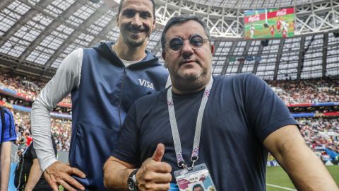 Raiola poses alongside Zlatan Ibrahimovic during the 2018 FIFA World Cup in Russia. 