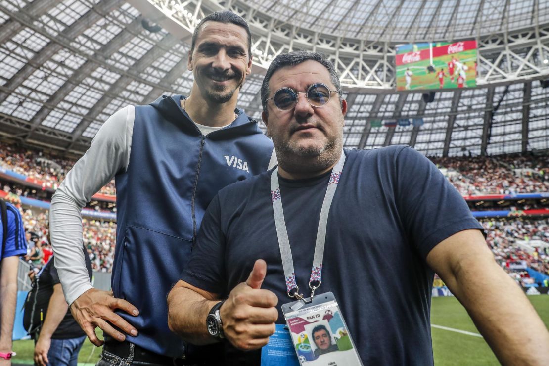 Raiola poses alongside Zlatan Ibrahimovic during the 2018 FIFA World Cup in Russia. 