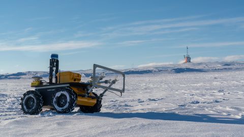 The ECHO rover is shown in front of the Single Penguin Observation & Tracking observatory.