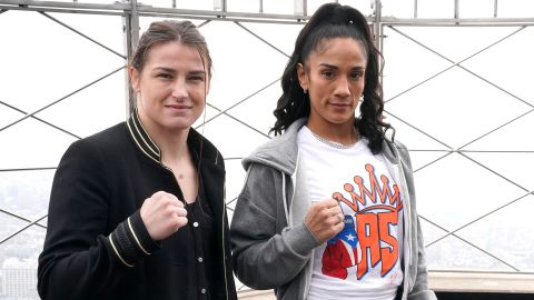 Taylor and Serrano stand for a photo prior to the kick off of fight week, on top of the Empire State Building in New York City on April 26, 2022.