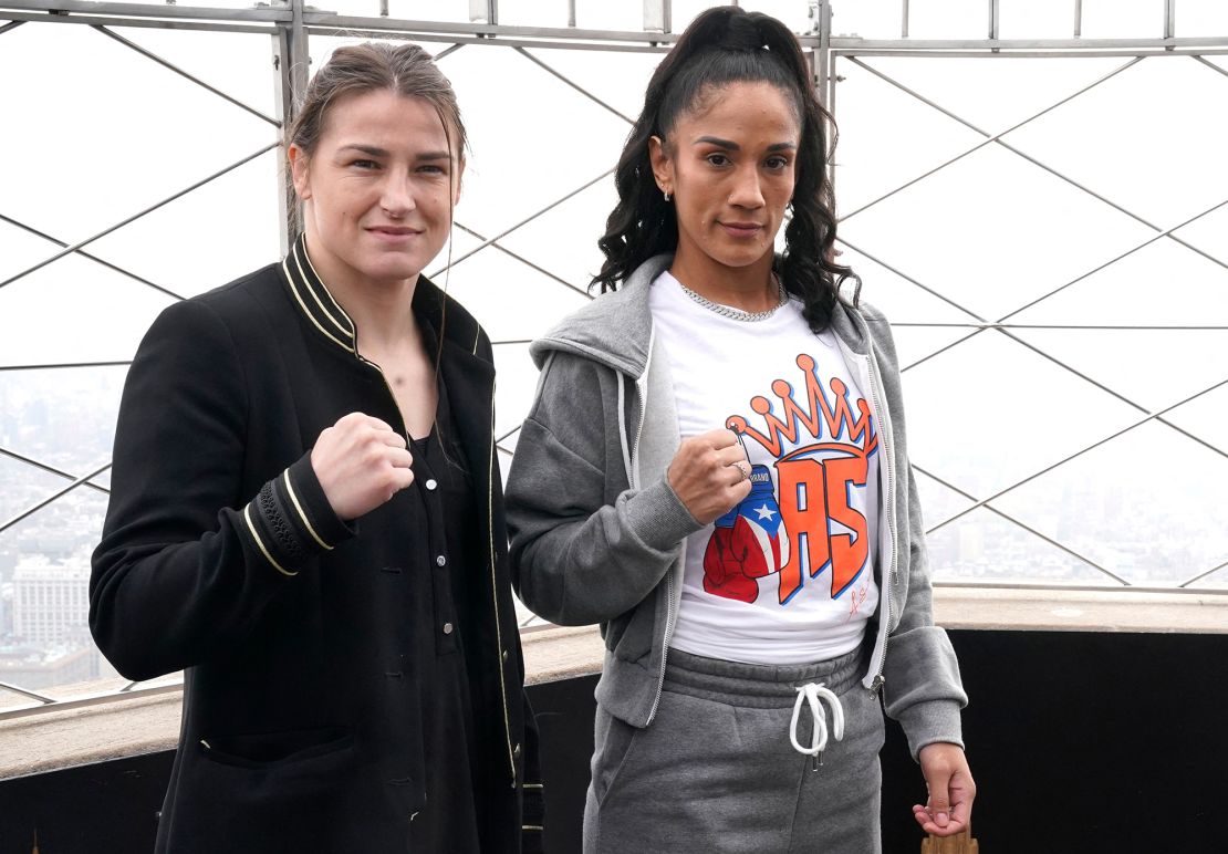 Taylor and Serrano stand for a photo prior to the kick off of fight week, on top of the Empire State Building in New York City on April 26, 2022.