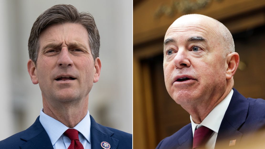 Rep. Greg Stanton of Arizona, left, and Homeland Security Secretary Alejandro Mayorkas, right. 