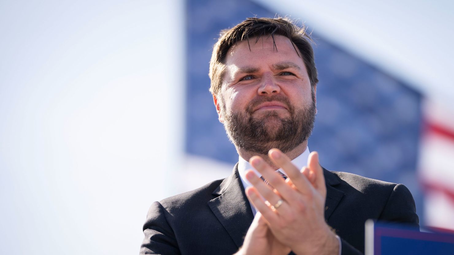 Republican Senate candidate J.D. Vance arrives onstage during a rally hosted by former President Donald Trump in Delaware, Ohio, on April 23, 2022.