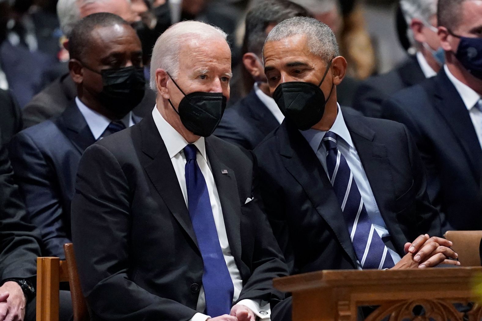 US President Joe Biden, left, talks with former President Barack Obama before the start of the <a href="index.php?page=&url=https%3A%2F%2Fwww.cnn.com%2F2022%2F04%2F27%2Fpolitics%2Fmadeleine-albright-funeral%2Findex.html" target="_blank">funeral service</a> for former Secretary of State <a href="index.php?page=&url=http%3A%2F%2Fwww.cnn.com%2F2022%2F03%2F23%2Fpolitics%2Fgallery%2Fmadeleine-albright%2Findex.html" target="_blank">Madeleine Albright</a> on Wednesday, April 27. Albright was the country's first female secretary of state. In his eulogy Wednesday, Biden described her as a "force of nature" and a champion of democracy.