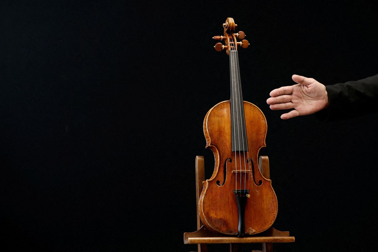 A rare violin that was made in 1736 by Giuseppe Guarneri is displayed at an auction house in Neuilly-sur-Seine, France, on Tuesday, April 26.