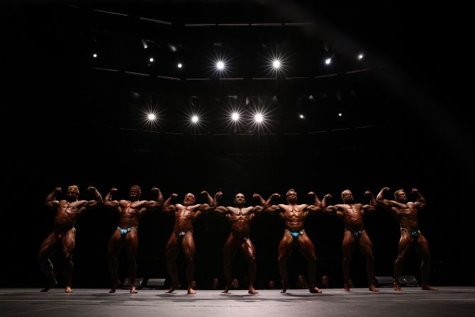 Pro bodybuilders compete in the open heavyweight division during a competition in Melbourne on Saturday, April 23.