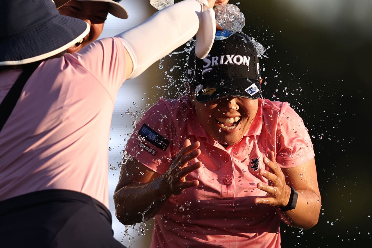 Pro golfer Nasa Hataoka is sprayed with water after winning the LA Open on Sunday, April 24.