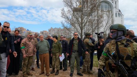 UN Secretary-General António Guterres, fourth left, is seen during his visit to Bucha, on the outskirts of Kyiv, on April 28, 2022. 