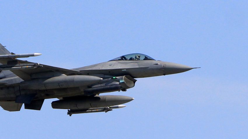 A F-16 fighting jet of the Polish Air Force flies over the air base during an exercise of NATO's Baltic air-policing mission at the Siauliai Air Base in Siauliai, Lithuania, August 30, 2017. / AFP PHOTO / Petras Malukas        (Photo credit should read PETRAS MALUKAS/AFP via Getty Images)