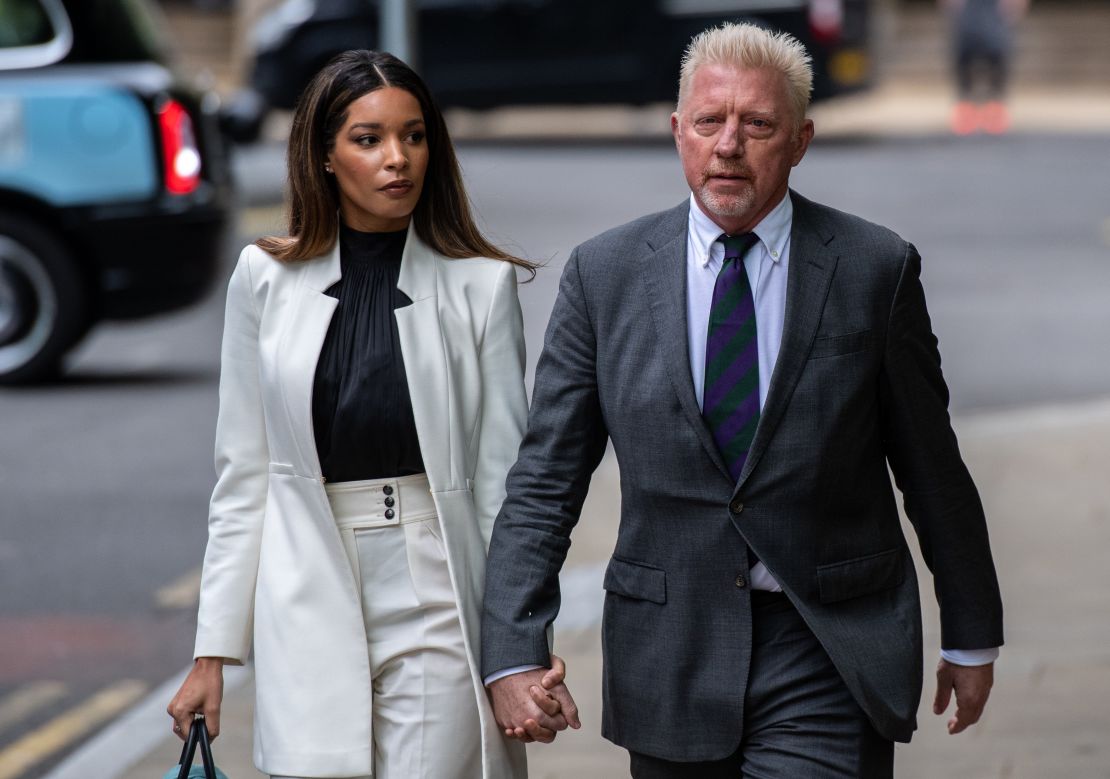 Becker arrives at court for his sentencing alongside girlfriend Lilian de Carvalho Monteiro.