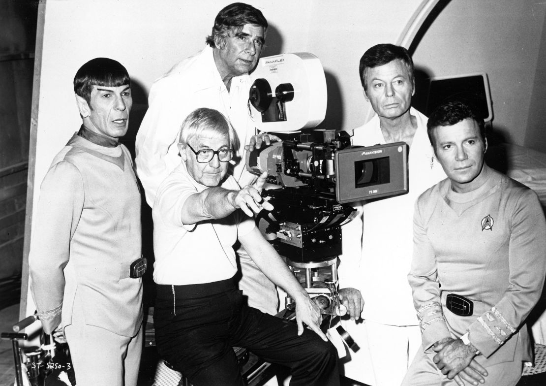 Actors Leonard Nimoy, DeForest Kelley and William Shatner pose for a portrait with "Star Trek" creator Gene Roddenberry, rear, and director Robert Wise, just left of camera, during the filming of the 1979 movie, "Star Trek: The Motion Picture." 
