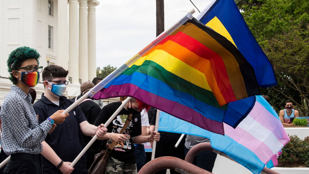 In this March 30, 2021, file photo, demonstrators for transgender rights rally outside the Alabama State House in Montgomery. 