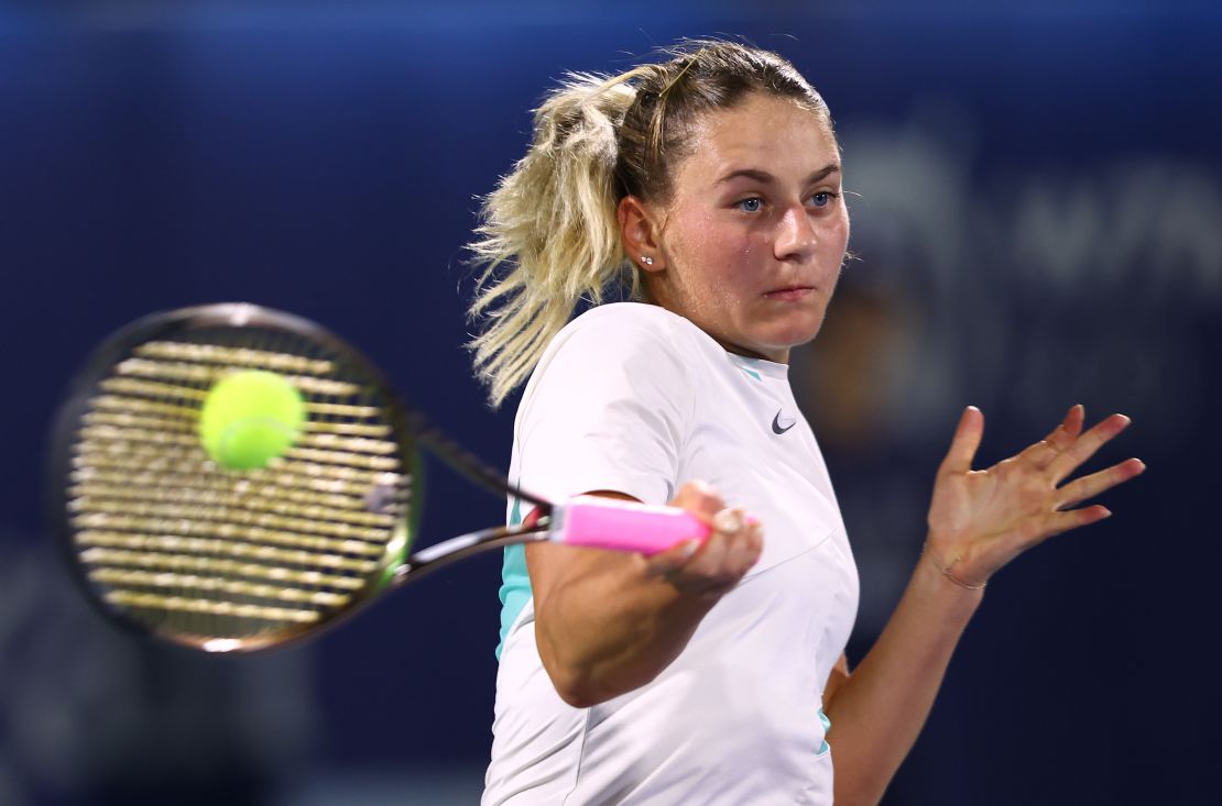 Kostyuk plays a shot in a match against Aryna Sabalenka of Belarus during day two of the Dubai Duty Free Tennis tournament on February 15, 2022.