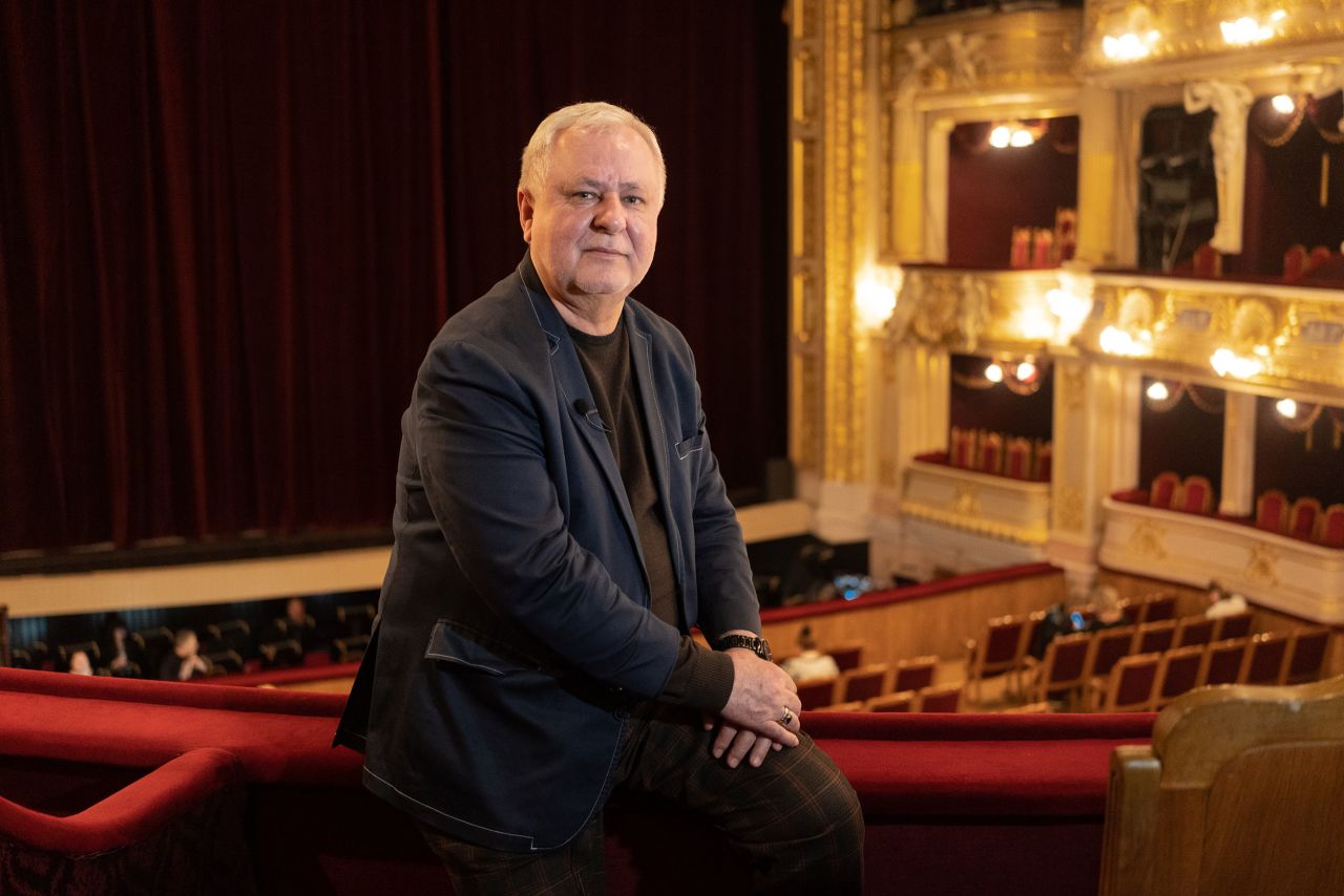 Vasyl Vovkun, 64, artistic director of the Lviv Opera, poses for a portrait in the theater hall.