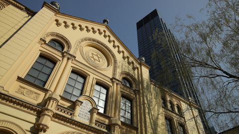 The Nożyk Synagogue, Warsaw's only surviving synagogue from before World War II, stands under a modern office building on April 12, 2018.