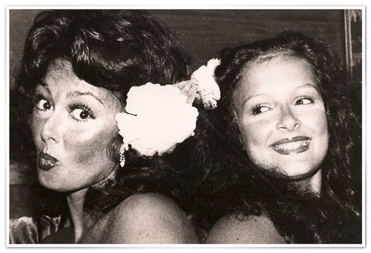 Judd, left, and Wynonna Judd pose for photos at a restaurant gig in 1978.