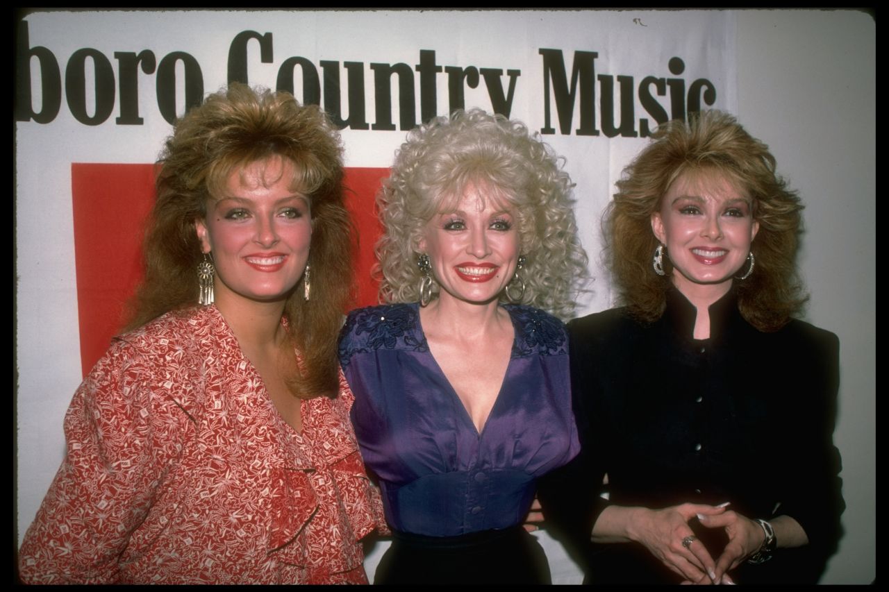 Wynonna Judd, Dolly Parton, and Naomi Judd attend the Marlboro Sponsored Country Music Tour on March 8, 1987, at Avery Fisher Hall at Lincoln Center in New York.