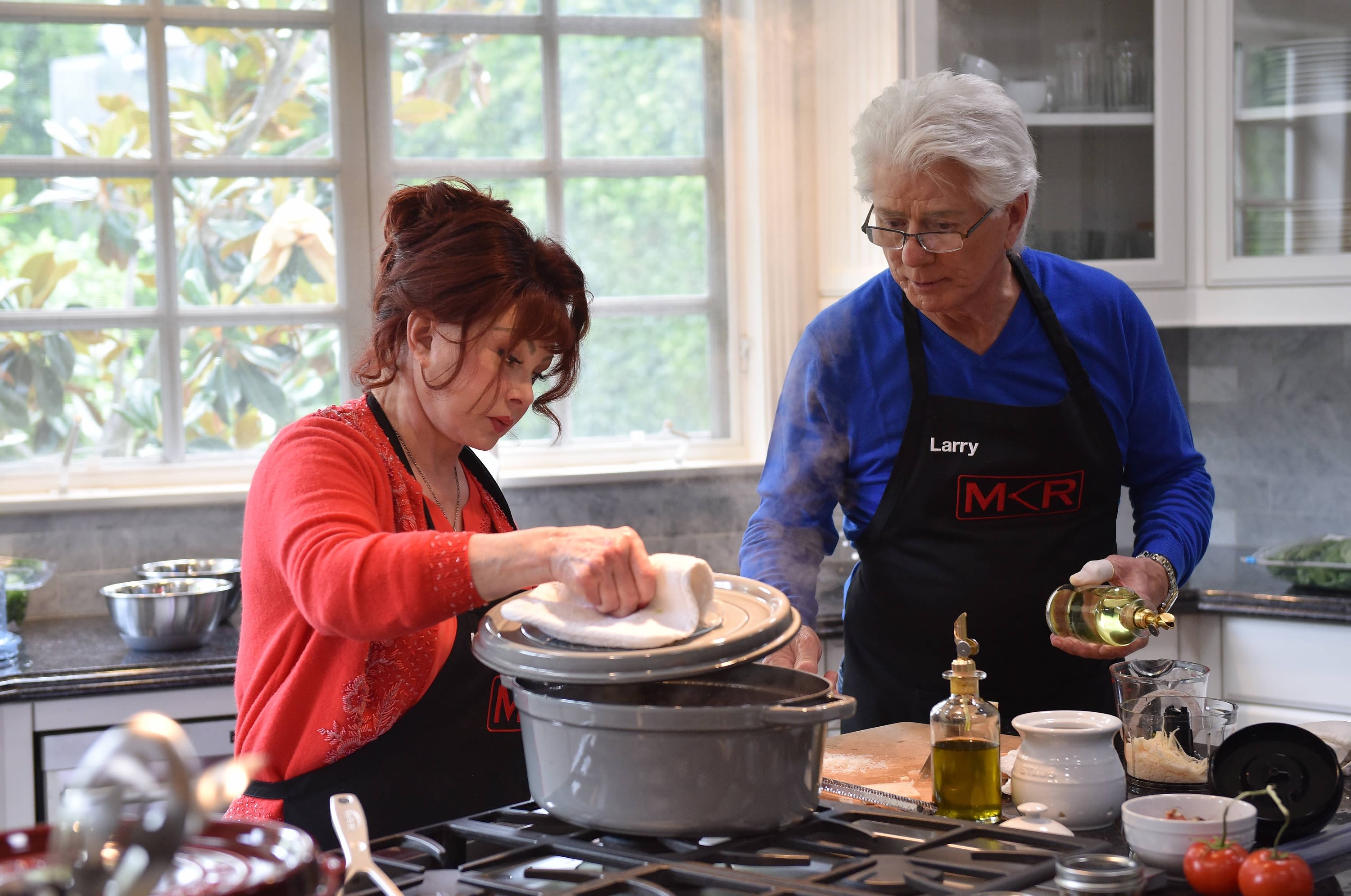 Judd and her husband, Larry Strickland, cook together in an episode of 'My Kitchen Rules' on January 19, 2017.