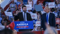 JD Vance, left, co-founder of Narya Capital Management LLC and U.S. Republican Senate candidate for Ohio, thanks former U.S. President Donald Trump for the official endorsement during the 'Save America' rally at the Delaware County Fairgrounds in Delaware, Ohio, U.S., on Saturday, April 23, 2022. The May 3 Republican primary for U.S. Senate in Ohio, is to replace retiring Republican U.S. Senator Rob Portman, who endorsed former Ohio Republican Party Chairwoman Jane Timken in the race, in a contest that could help determine control of the Senate, currently deadlocked at 50-50 between Democrats and Republicans. Photographer: Eli Hiller/Bloomberg via Getty Images