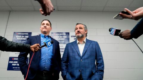 Josh Mandel, left, and Sen. Ted Cruz of Texas meet with members of the media before a campaign event at High Street Baptist Church, in Columbus, Ohio, Saturday, April 30, 2022.