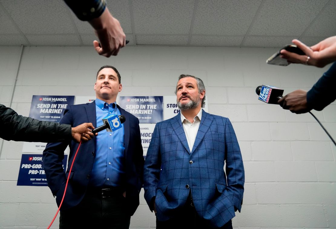 Josh Mandel, left, and Sen. Ted Cruz of Texas meet with members of the media before a campaign event at High Street Baptist Church, in Columbus, Ohio, Saturday, April 30, 2022. 