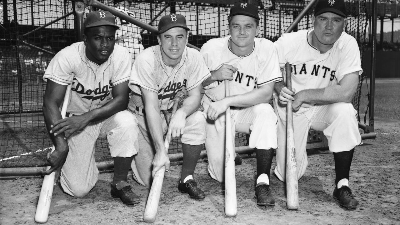 Jackie Robinson (left) is pictured ahead of the All-Star Game in 1949.