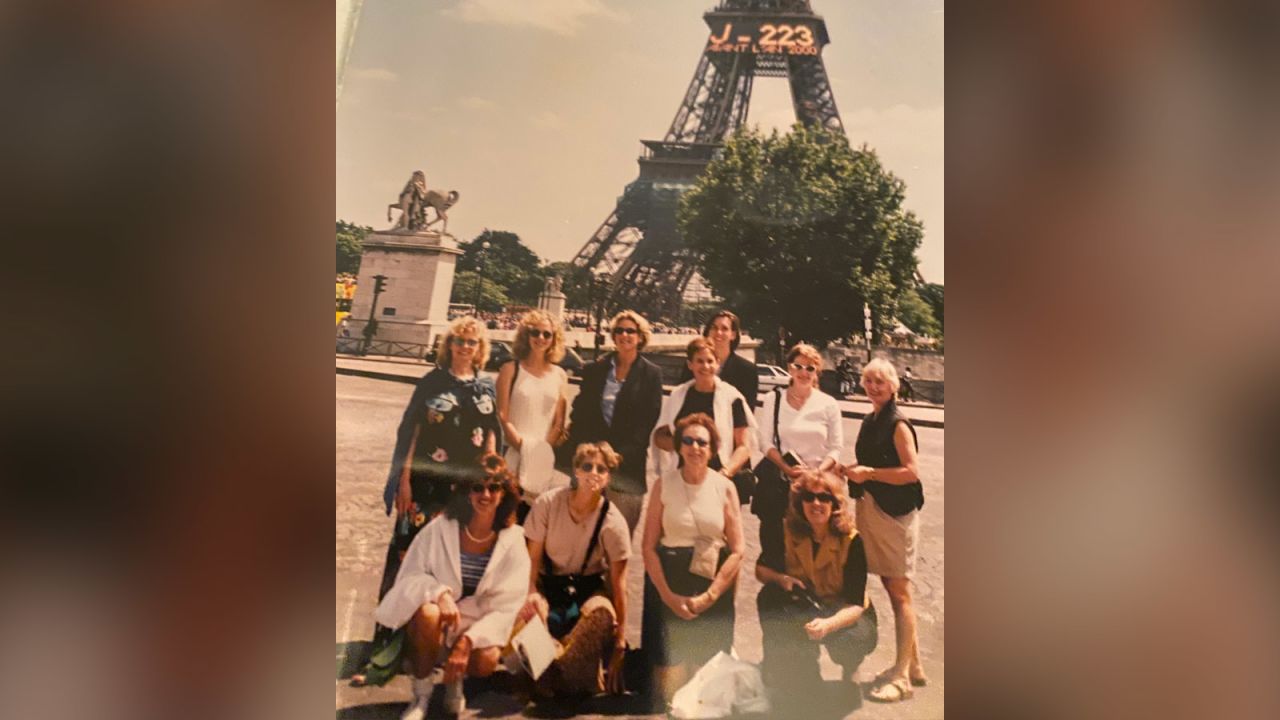 Peck, shown here with members of her tennis tour group near the Eiffel Tower, says she isn't sure now which of her friends was sitting in the row near her on the flight back to Minneapolis. Zugay remembered another person named Tracy, and helping someone with knitting. Peck was the only Tracy in the group, but coaches say at least two others were knitters. Zugay hopes she'll also have a chance to speak with whoever it was someday.