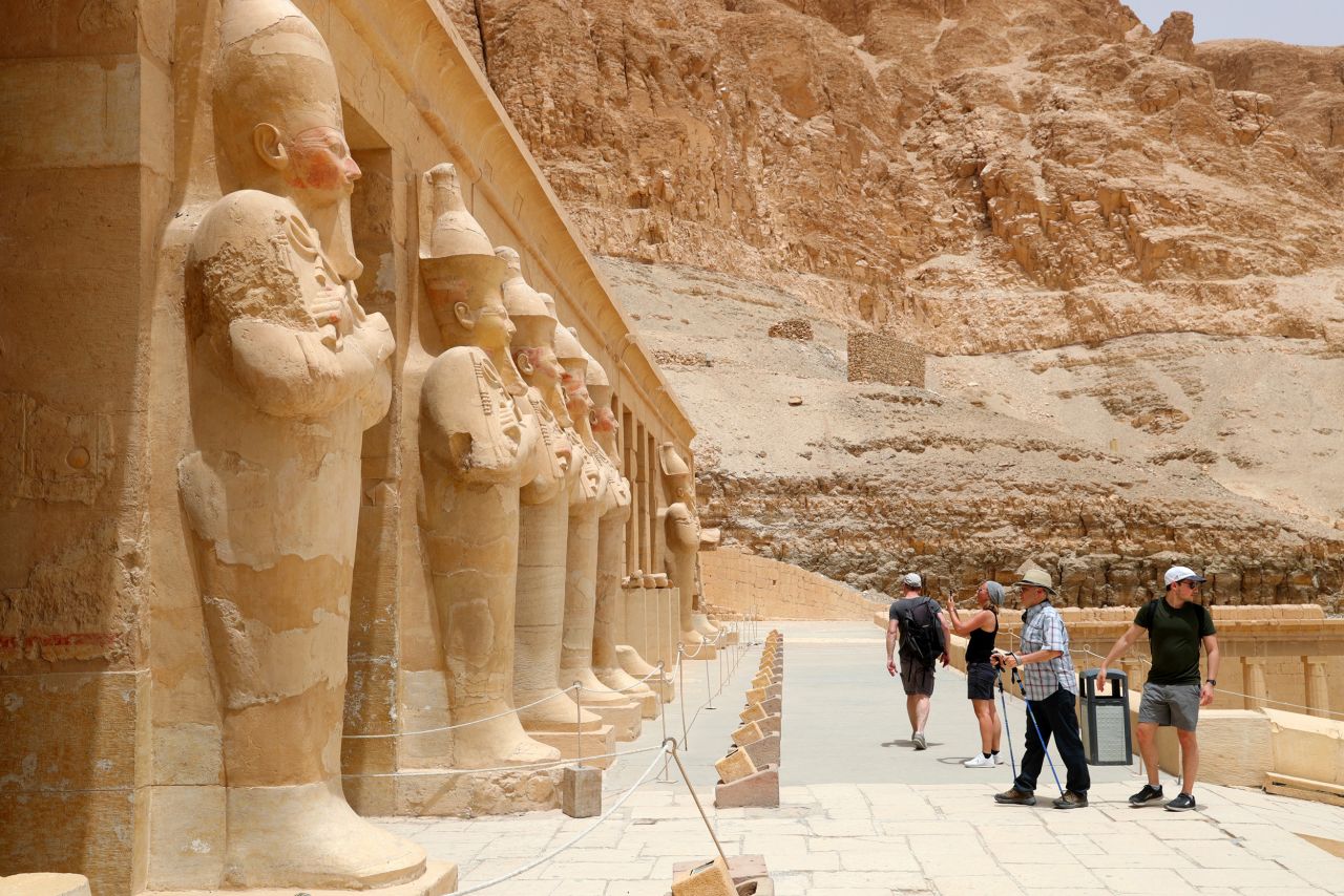 Tourists visit the Temple of Hatshepsut in Luxor on April 26, 2022. Egypt was placed into the "unknown" risk category on Monday.