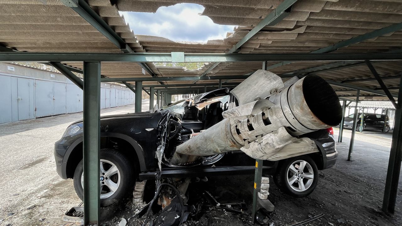 A Smerch rocket lodged in a car in Kharkiv.