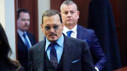 Actor Johnny Depp arrives in the courtroom after lunch, at the Fairfax County Circuit Court in Fairfax, Va., Monday May 2, 2022. Depp sued his ex-wife Amber Heard for libel in Fairfax County Circuit Court after she wrote an op-ed piece in The Washington Post in 2018 referring to herself as a "public figure representing domestic abuse."