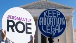 Pro-life activists counter-demonstrate as pro-choice activists participate in a "flash-mob" demonstration outside of the US Supreme Court on January 22, 2022 in Washington, DC. - January 22 marks the 49th anniversary of Roe v. Wade, the landmark case that established the constitutional right to abortion care in the United States. (Photo by Alex Edelman / AFP) (Photo by ALEX EDELMAN/AFP via Getty Images)