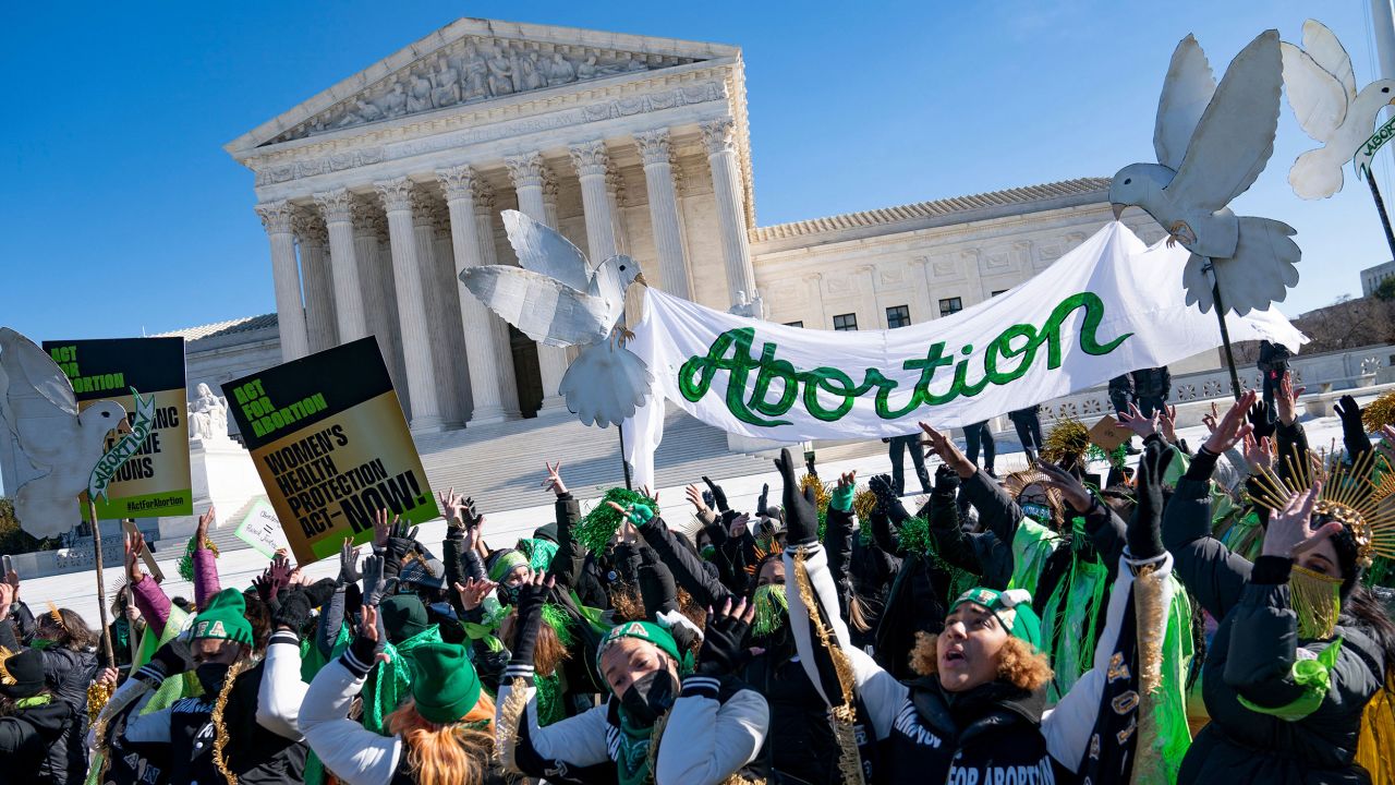 Pro-choice activists participate in a "flash-mob" demonstration outside the US Supreme Court building on January 22, 2022, in Washington.