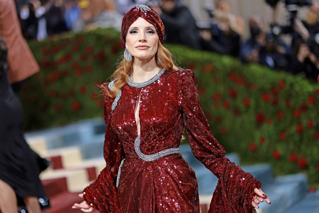 Jessica Chastain wore an embellished ruby Gucci gown with a matching turban.