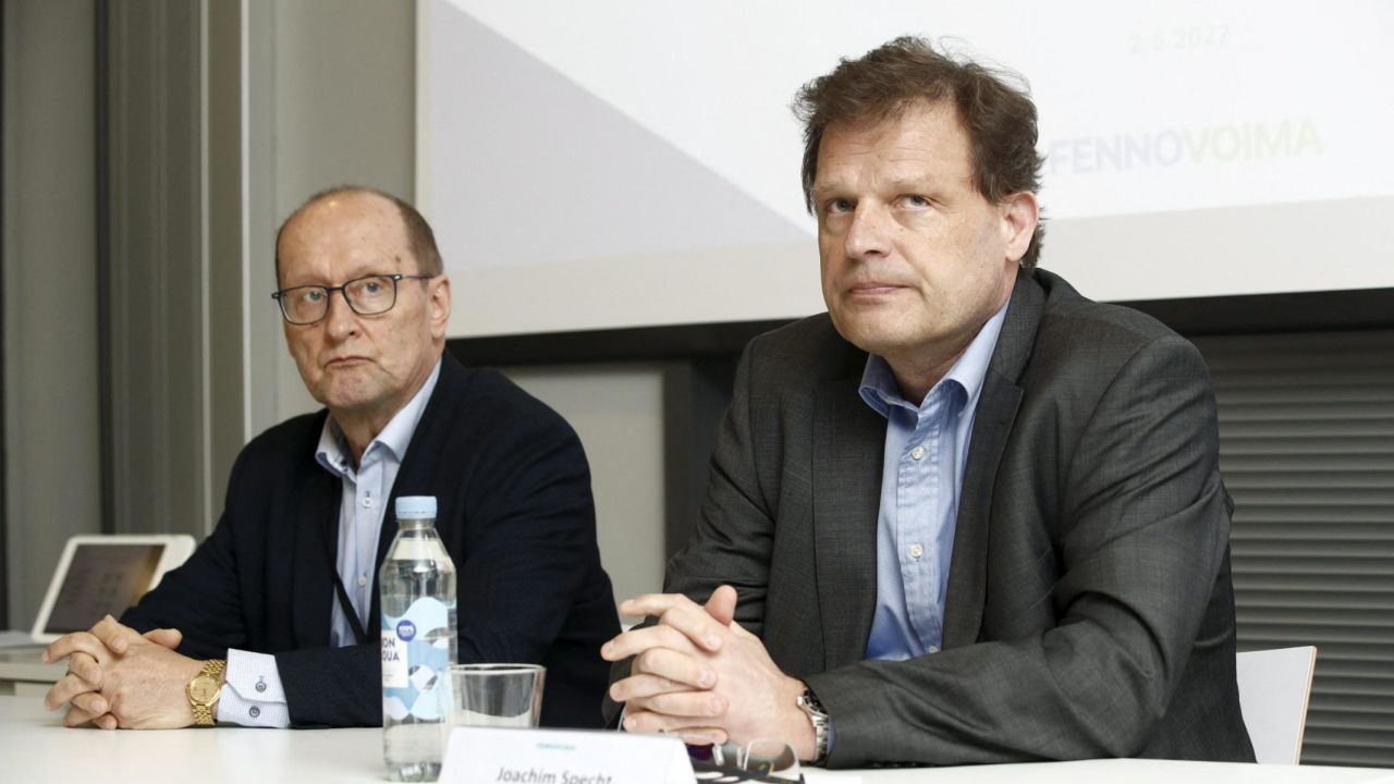 Fennovoima chairman of the board Esa Harmala (L) and CEO Joachim Specht (R) attend a press conference in Helsinki, Finland on May 2, 2022. 