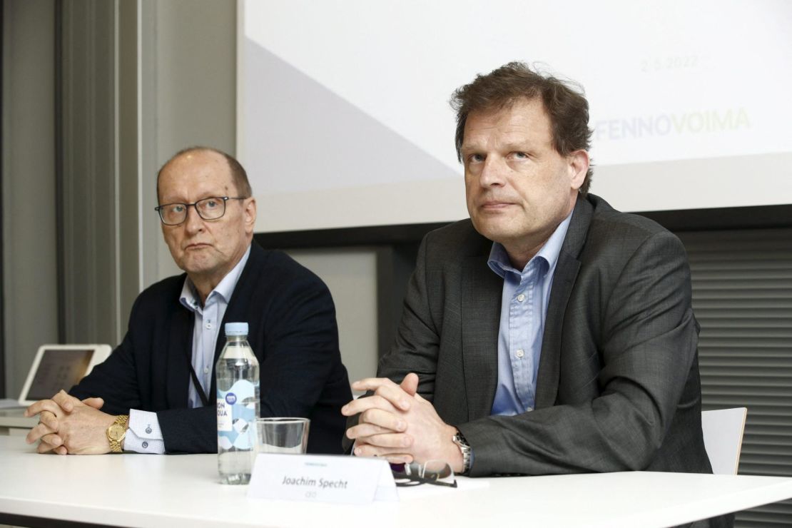 Fennovoima chairman of the board Esa Harmala (L) and CEO Joachim Specht (R) attend a press conference in Helsinki, Finland on May 2, 2022.