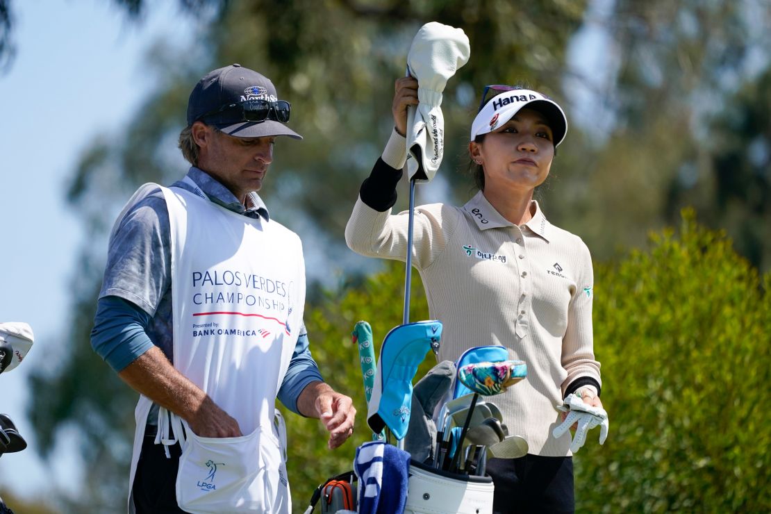 Ko chooses a club at the fourth tee during the final round of the Palos Verdes Championship.