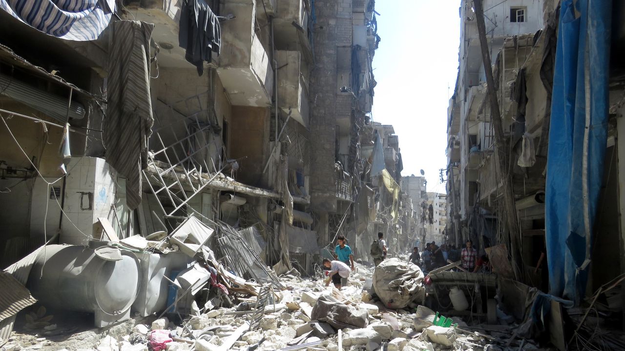 A street in the rebel-held Salihin neighborhood of Aleppo is littered with debris on September 11, 2016, after Russia attacked the residential area with cluster bombs.