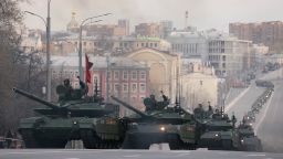 Russian service members drive tanks along the street before a rehearsal for the Victory Day military parade in Moscow, Russia April 28, 2022. REUTERS/Maxim Shemetov