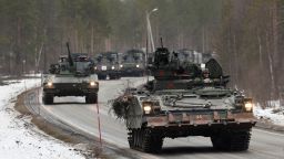 Swedish Army armoured vehicles and tanks participate in a military exercise called "Cold Response 2022", gathering around 30,000 troops from NATO member countries as well as Finland and Sweden, amid Russia's invasion of Ukraine, in Setermoen in the Arctic Circle, Norway, March 25, 2022. REUTERS/Yves Herman 