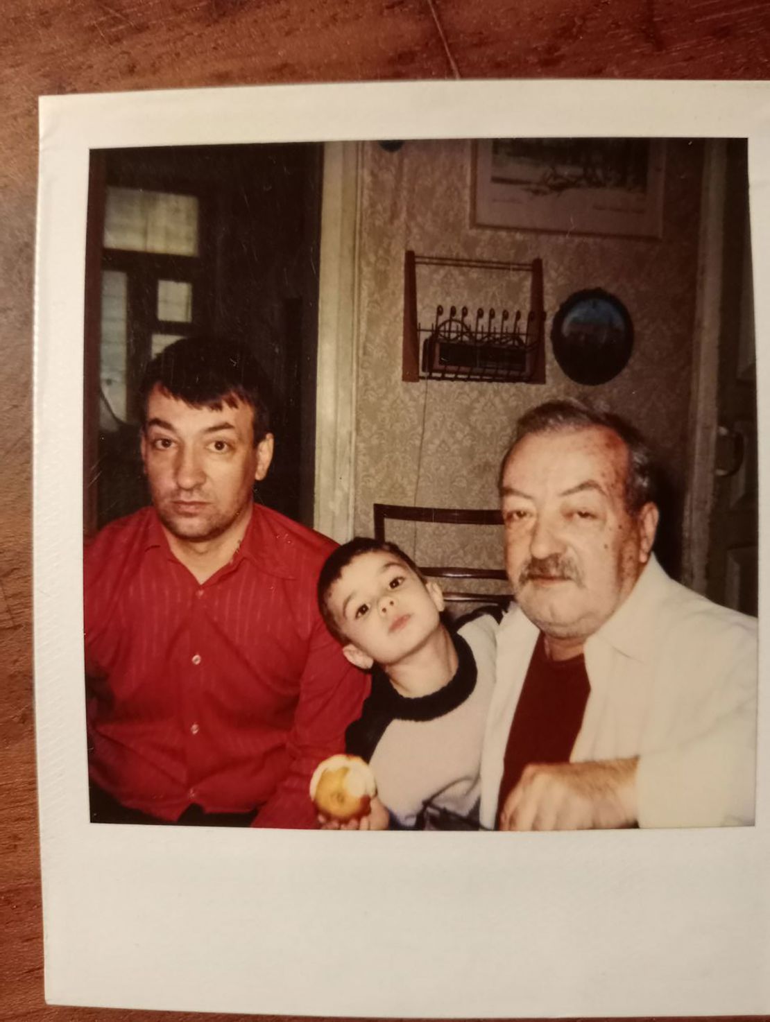 A photo supplied by the Makovetskyi family shows Ivan as a child with his father, Yuri (L), and his grandfather, Vadim (R).